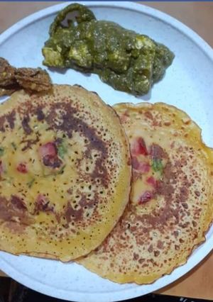 A picture of Besan Chilla/ Tomato Omellete.