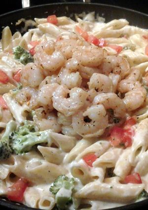 A picture of Mostaccioli Alfredo w/ caribbean shrimp.