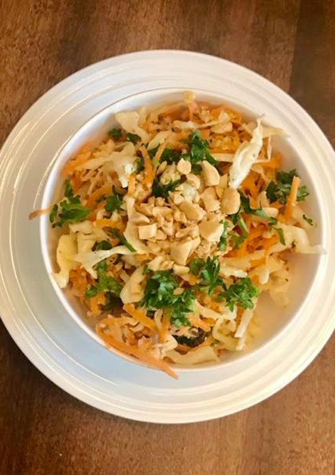 A picture of Cabbage and carrot salad.