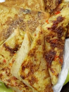 A picture of Fried egg with bread.