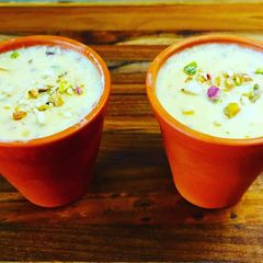A picture of Two flavored lassi sweet and salty.