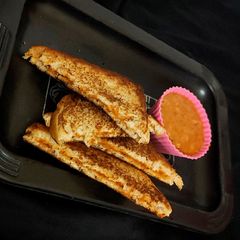 A picture of Bread Toast with Thousand Island Dressing.