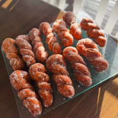 A picture of Korean sticky rice donuts (꽈배기).