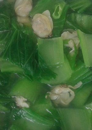 Hình của món Canh Nghêu nấu cải bẹ xanh.