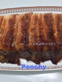 Una foto de Pastel de pollo y jamón dé York envuelto en bacon