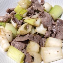 A picture of Sauteed Leeks and Beef.