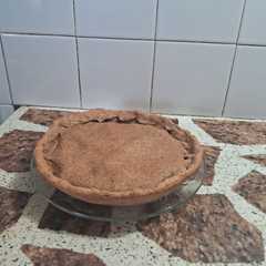 Una foto de Tarta integral bicolor de zapallo y espinaca