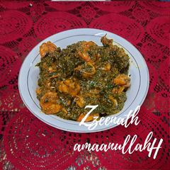 A picture of Prawns with Spinach and Spring Onion Greens.