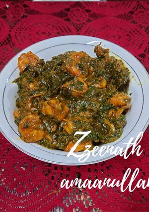 A picture of Prawns with Spinach and Spring Onion Greens.