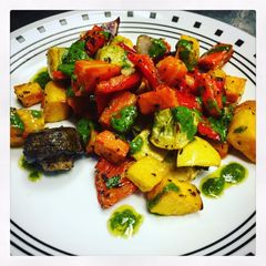 A picture of Autumn Roasted Vegetables with Chimichurri Sauce.