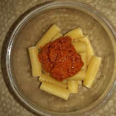 A picture of Tortiglioni with Red Tomato Pesto.