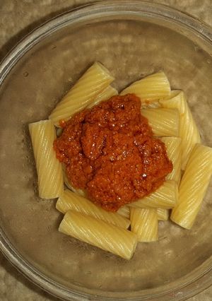 A picture of Tortiglioni with Red Tomato Pesto.