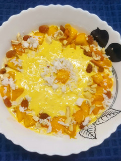 A picture of Chilled Himsagar Mango Coconut Rice Kheer or Pudding.
