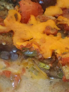 Una foto de Pastelón de berenjenas, salsa pizza y coco