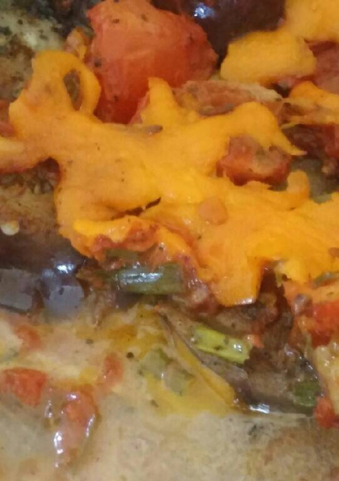 Una foto de Pastelón de berenjenas, salsa pizza y coco