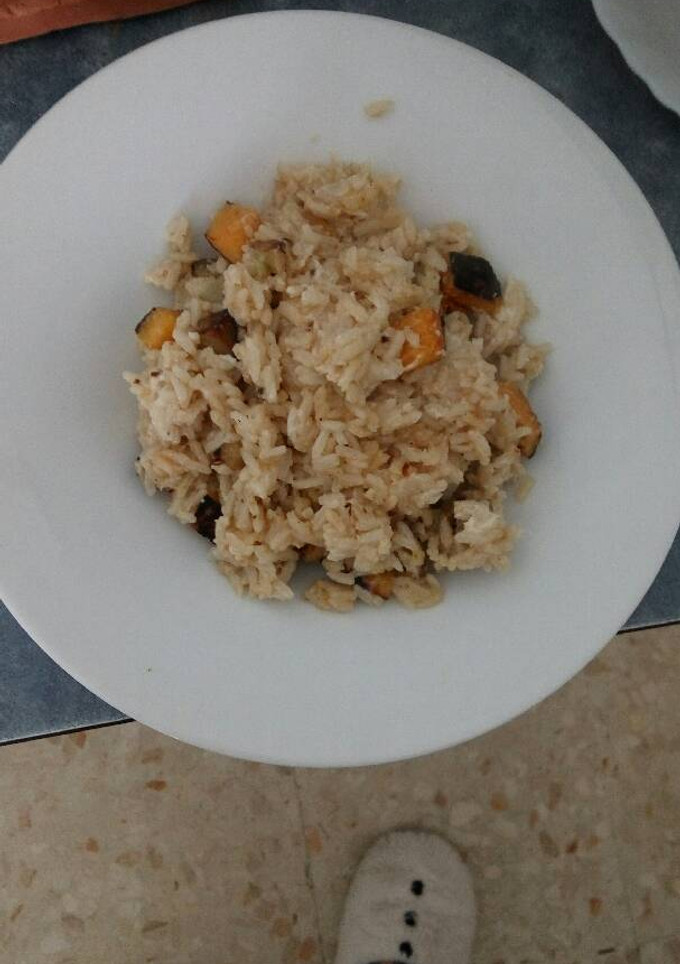 Una foto de Arroz con calabaza, berenjena y queso
