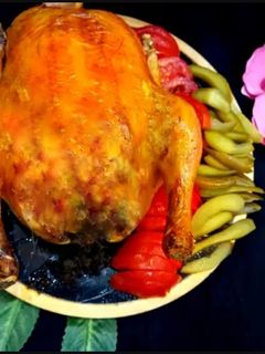 عکسی از دستور مرغ شکم پر با گردو و رب انار