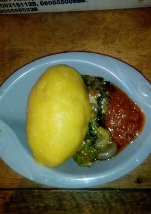 A picture of Eba and Okro soup with Left over stew.