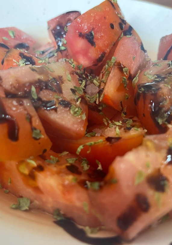 Una foto de Tomates Aliñados