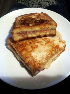 A picture of French Toast with jam.