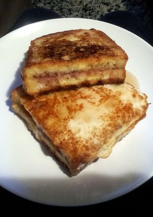 A picture of French Toast with jam.