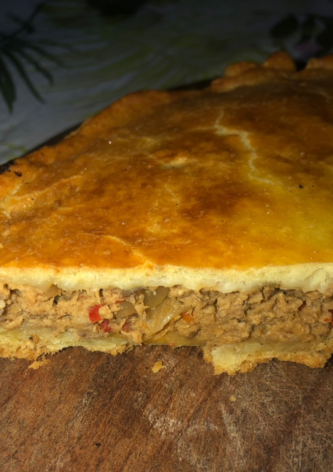 Una foto de Tarta de atún con masa casera👌