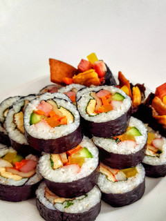A picture of Kimbap (Korean seaweed rice rolls).
