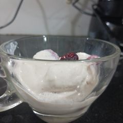 A picture of Grapes in Red wine with Cream.