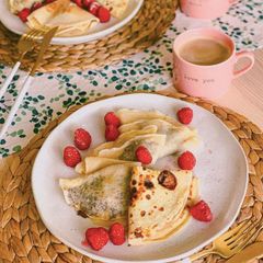 A picture of Crepes with Nutella and banana 🥞.