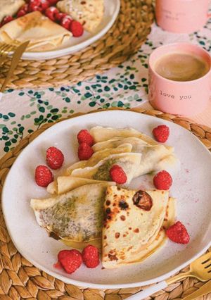A picture of Crepes with Nutella and banana 🥞.