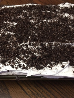 A picture of Cookies and cream poke cake.