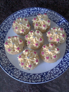A picture of Queen cupcakes with lemon icing.