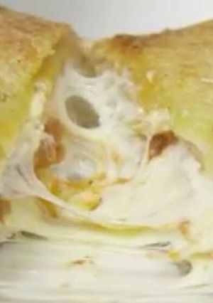 A picture of Cheesy Lasagna Stuffed Garlic Bread.