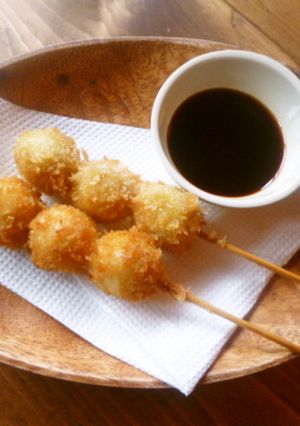 A picture of Fried Quail Eggs on Skewers.