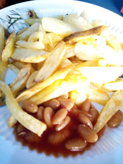 A picture of Fries and baked beans.