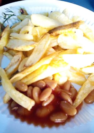 A picture of Fries and baked beans.