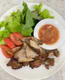 Roasted garlic marinated pork collar with spicy Thai-style sauce
