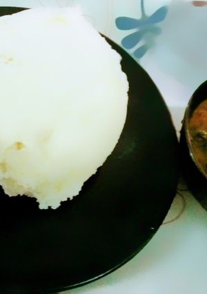 A picture of Pounded yam and Vegetables soup.