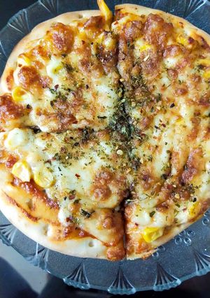 A picture of Cheese corn pizza.