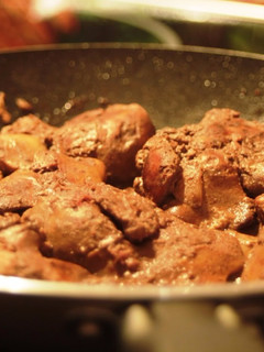 Una foto de Higaditos de pollo encebollados