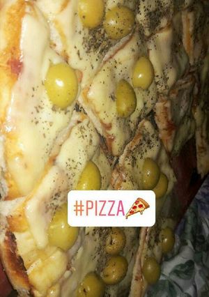 Una foto de Pizza