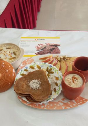 A picture of Rice puding with malpua.