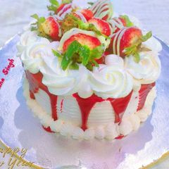 A picture of Red velvet cake with cheese frosting.