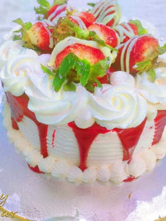 A picture of Red velvet cake with cheese frosting.
