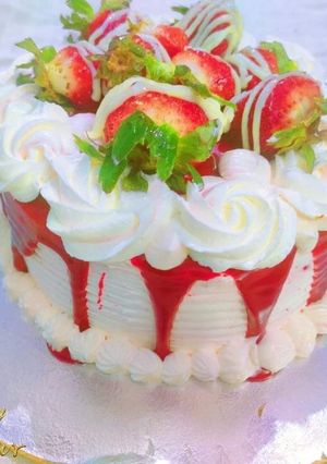 A picture of Red velvet cake with cheese frosting.