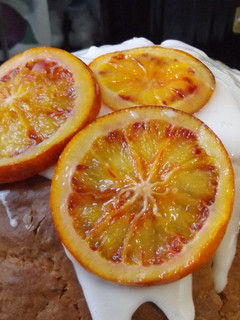 Una foto de Naranjas en almíbar de naranja y ron