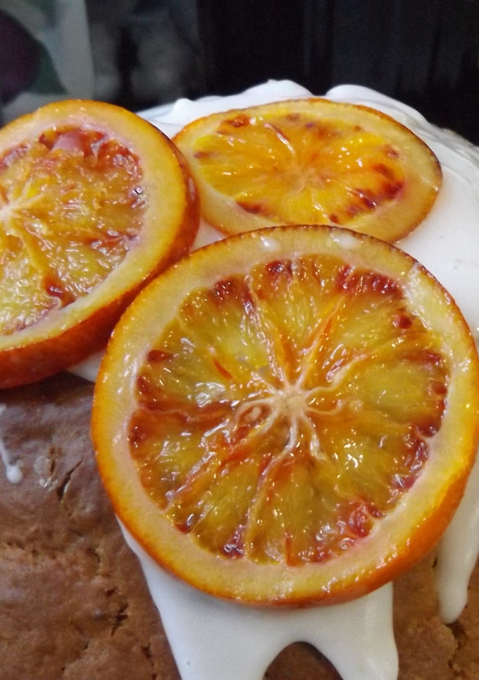 Una foto de Naranjas en almíbar de naranja y ron