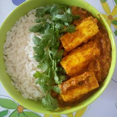 A picture of White rice with paneer masala.