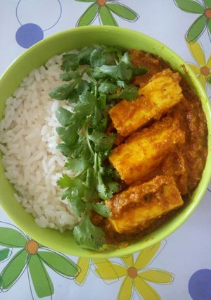 A picture of White rice with paneer masala.
