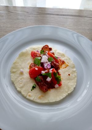 A picture of Adobe pork taco's.